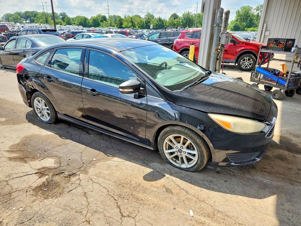 Photo 4 from auction – 2016 FORD FOCUS with VIN 1FADP3F25GL337558