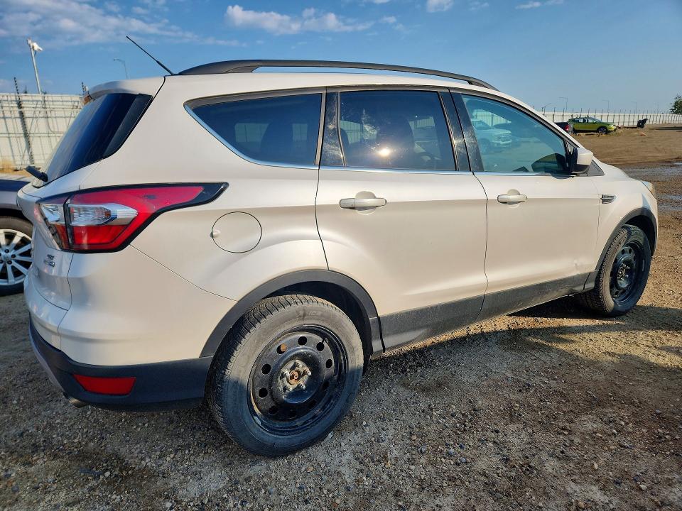 Photo 3 from auction – 2017 FORD ESCAPE with VIN 1FMCU9GD0HUB63892