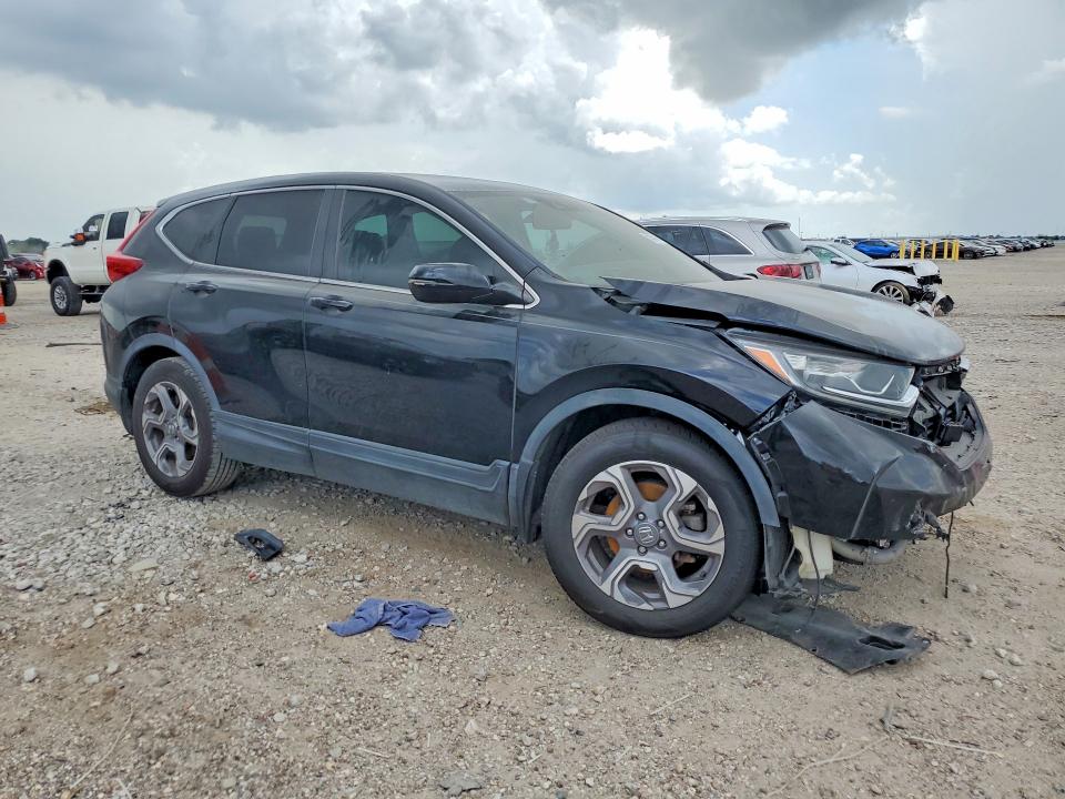 Photo 4 from auction – 2019 HONDA CR-V with VIN 7FARW1H55KE039073
