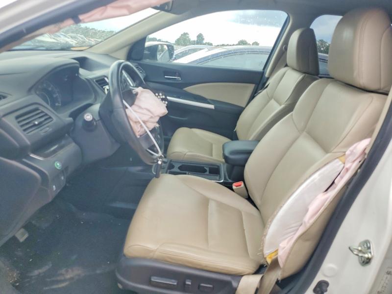Photo 7 from auction – 2016 HONDA CR-V with VIN 5J6RM4H71GL114967