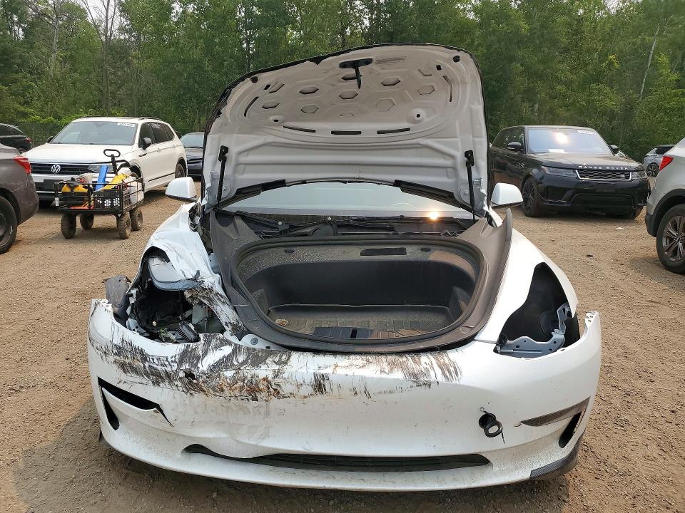 Photo 5 from auction – 2023 TESLA MODEL 3 with VIN LRW3E1FA4PC920658