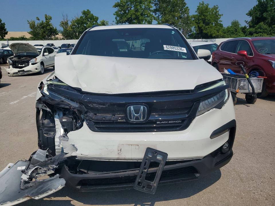 Photo 5 from auction – 2021 HONDA PILOT with VIN 5FNYF6H73MB062974