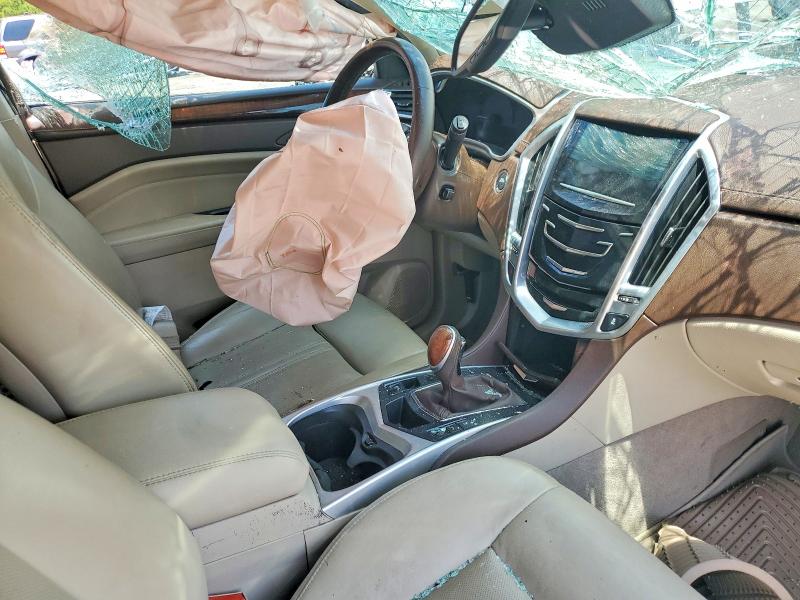 Photo 8 from auction – 2014 CADILLAC SRX with VIN 3GYFNCE32ES662608