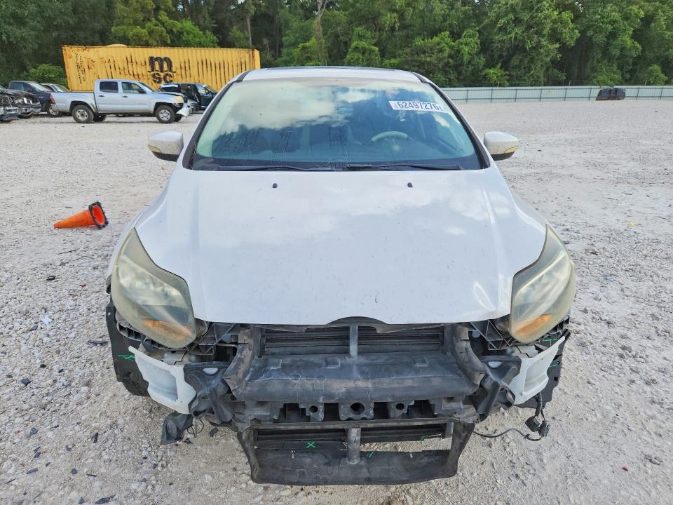 Photo 5 from auction – 2014 FORD FOCUS with VIN 1FADP3J21EL349100