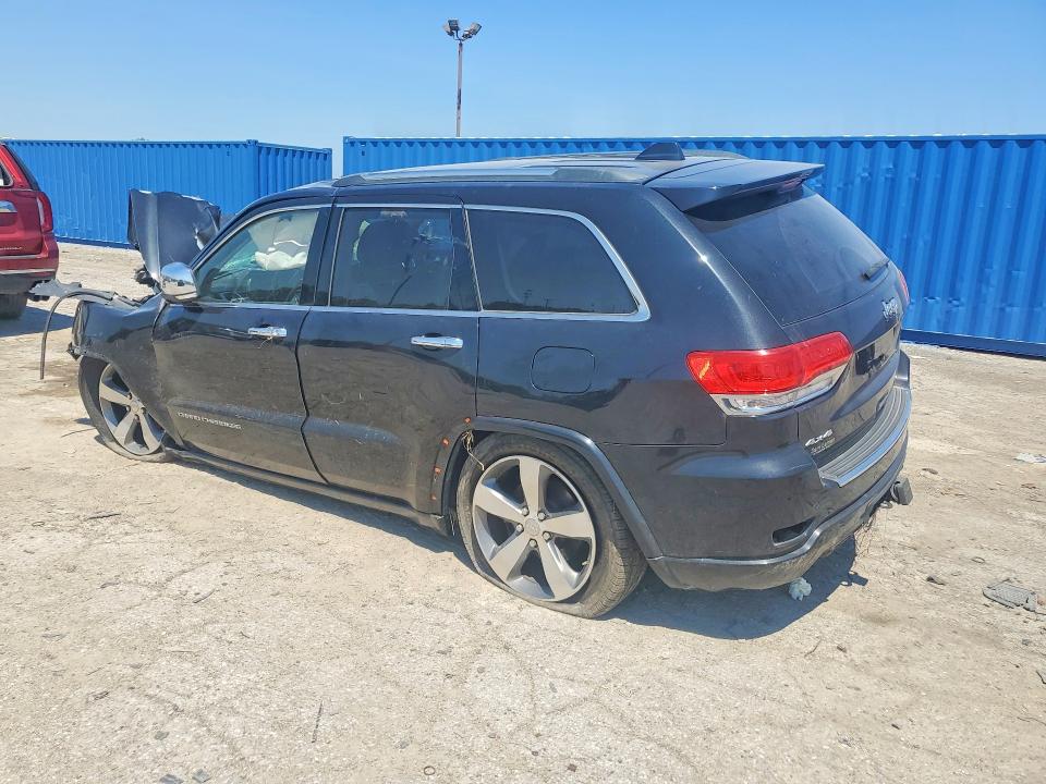Photo 2 from auction – 2014 JEEP GRAND CHEROKEE with VIN 1C4RJFCG3EC579975