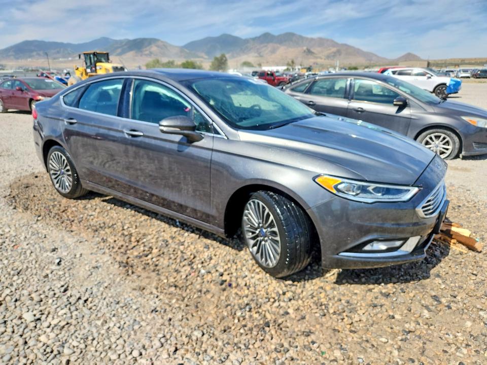 Photo 4 from auction – 2017 FORD FUSION with VIN 3FA6P0T91HR200838