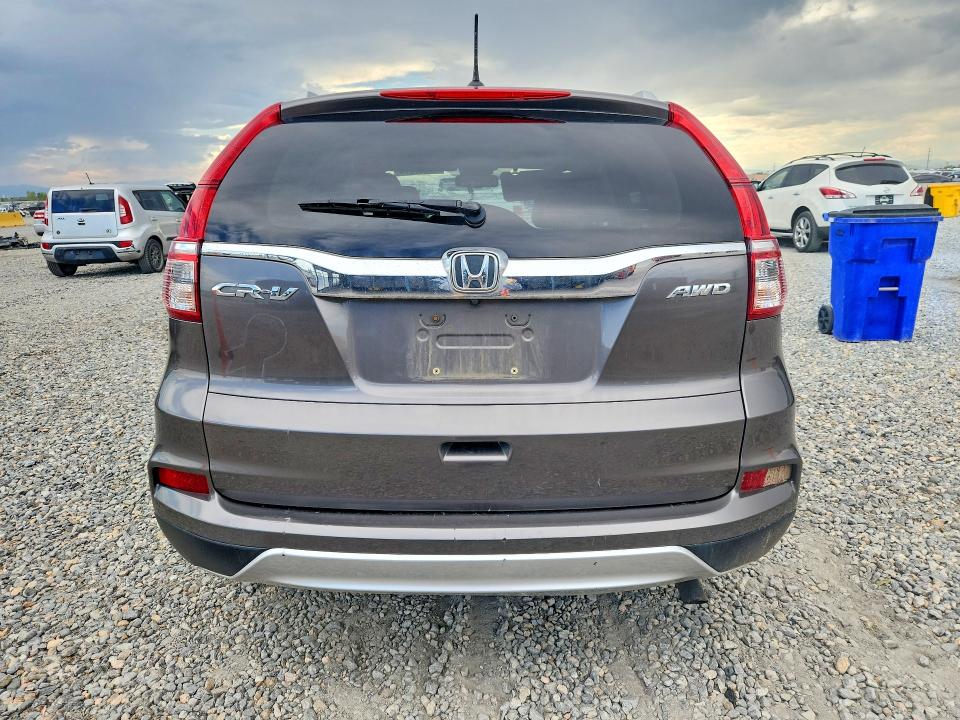 Photo 6 from auction – 2016 HONDA CR-V with VIN 2HKRM4H71GH626268