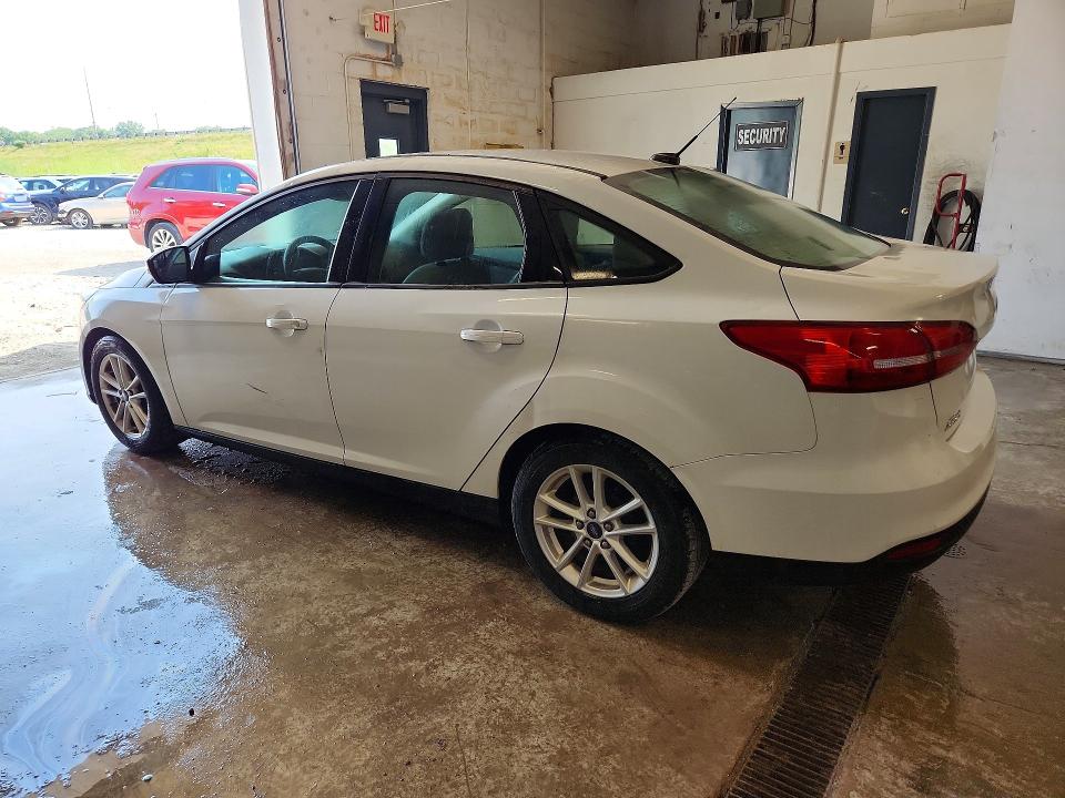 Photo 2 from auction – 2015 FORD FOCUS with VIN 1FADP3F21FL328810