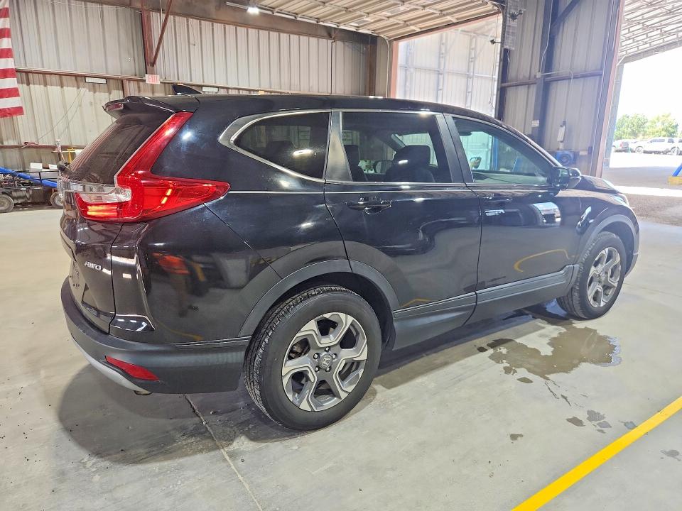 Photo 3 from auction – 2019 HONDA CR-V with VIN 2HKRW2H8XKH676893