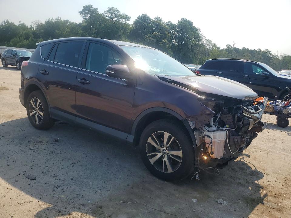 Photo 4 from auction – 2018 TOYOTA RAV4 with VIN 2T3RFREV6JW797219