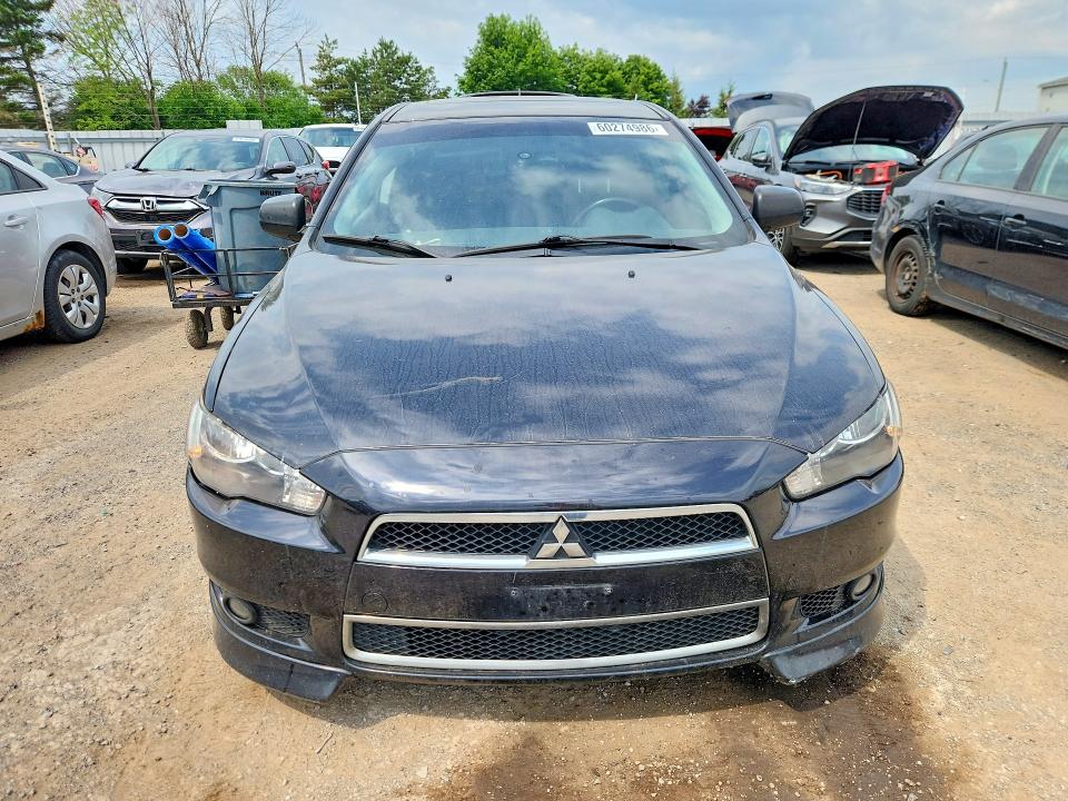 Photo 5 from auction – 2013 MITSUBISHI LANCER with VIN JA32U2FU2DU610496