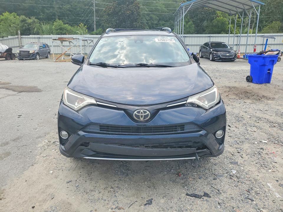Photo 5 from auction – 2017 TOYOTA RAV4 with VIN JTMWFREV2HJ707950