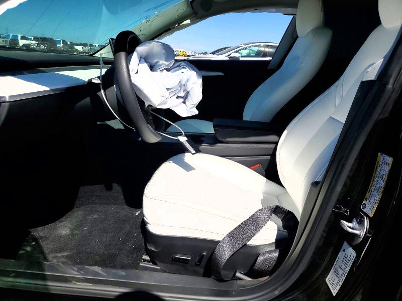 Photo 7 from auction – 2023 TESLA MODEL 3 with VIN 5YJ3E1EA8PF646324