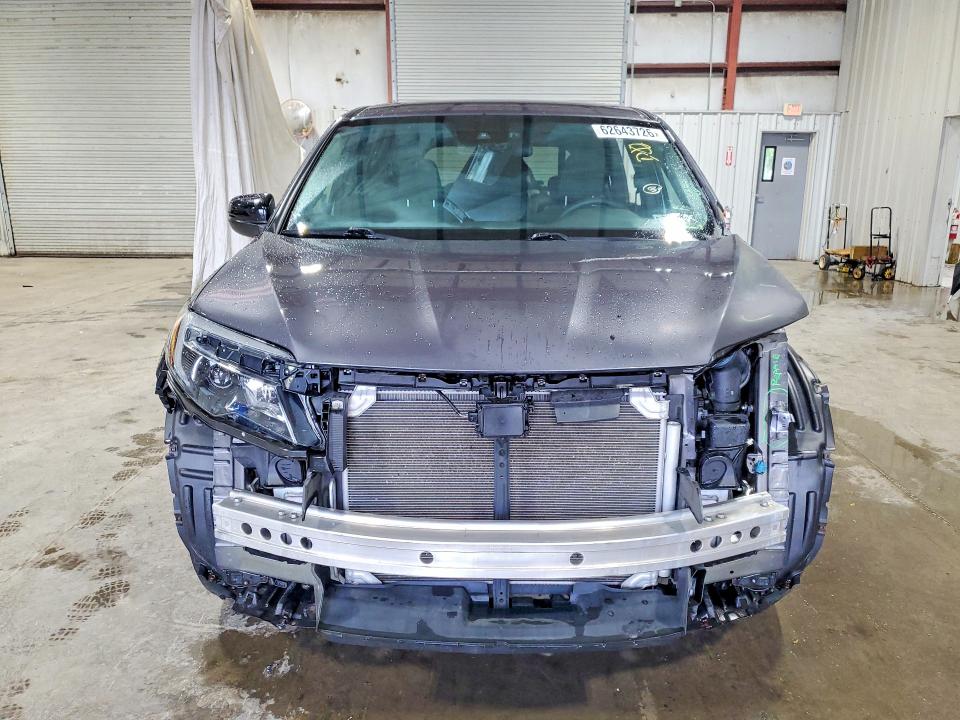 Photo 5 from auction – 2021 HONDA PASSPORT with VIN 5FNYF8H23MB006498