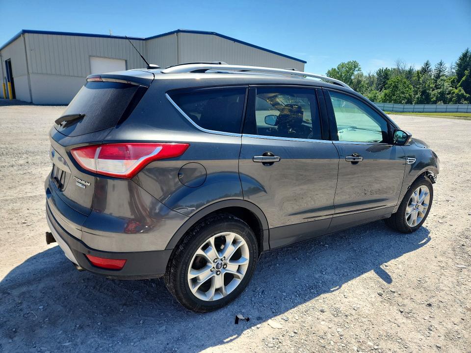 Photo 3 from auction – 2016 FORD ESCAPE with VIN 1FMCU9J98GUA82142