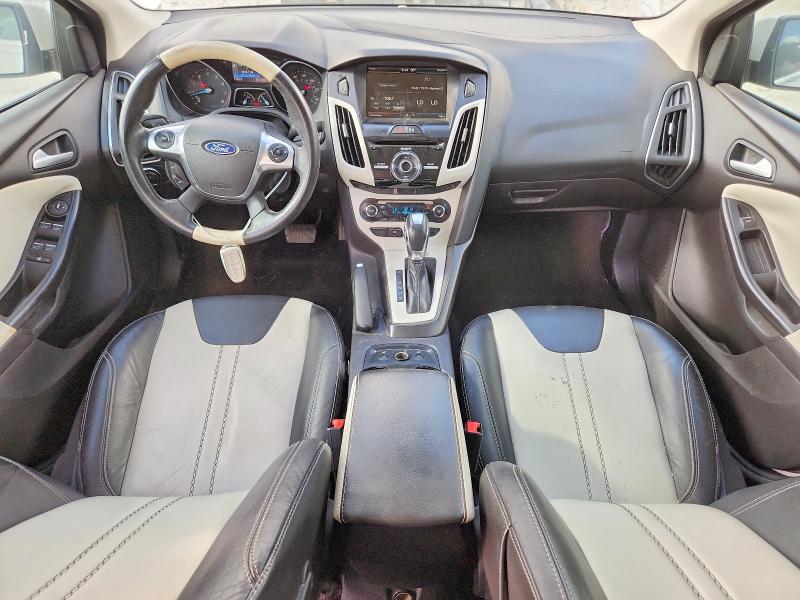 Photo 8 from auction – 2014 FORD FOCUS with VIN 1FADP3J21EL349100