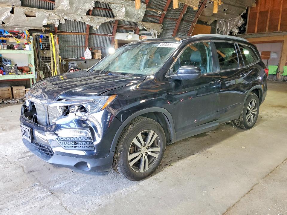 HONDA PILOT 2016 with VIN 5FNYF6H57GB068554 - Photo from auction