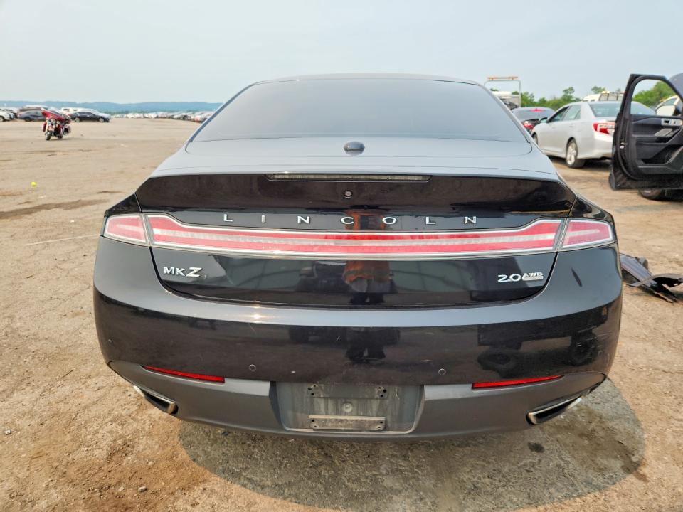 Foto 6 de la subasta – 2014 LINCOLN MKZ con VIN 3LN6L2J91ER805986