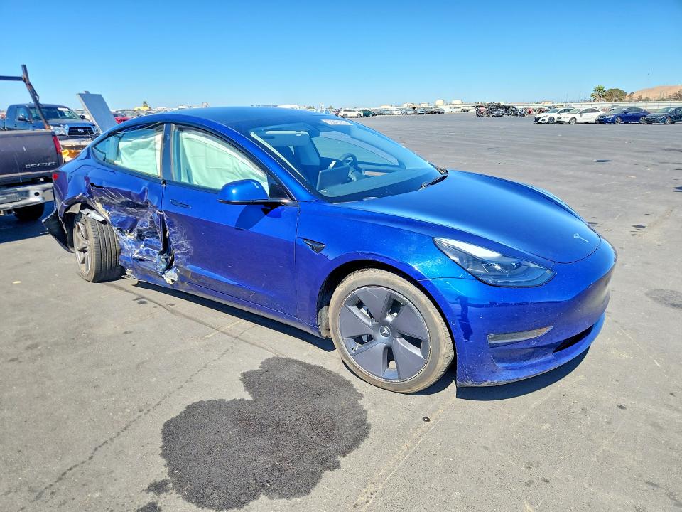 Photo 4 from auction – 2022 TESLA MODEL 3 with VIN 5YJ3E1EB2NF353833