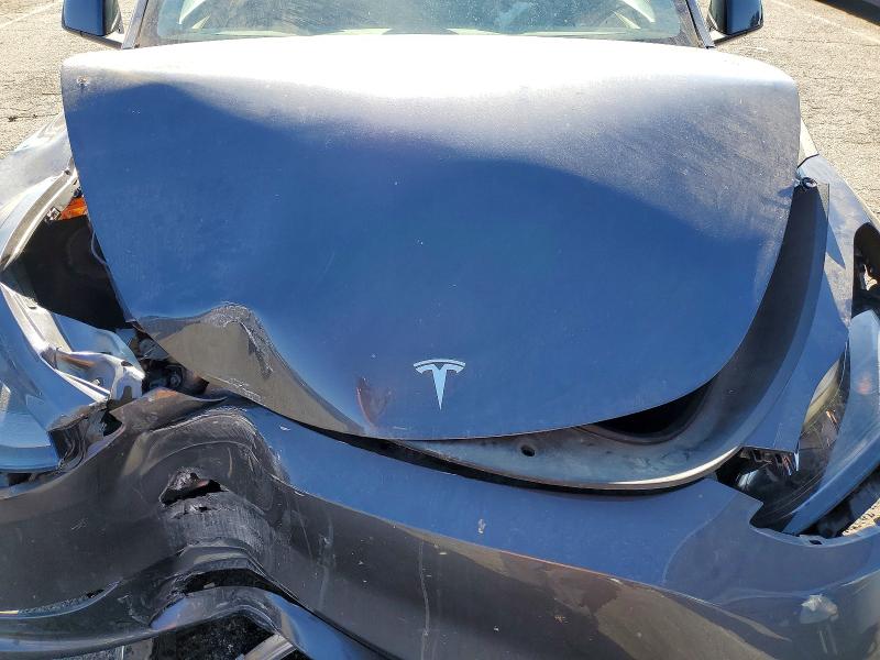 Photo 11 from auction – 2023 TESLA MODEL Y with VIN 7SAYGDEE0PA168372