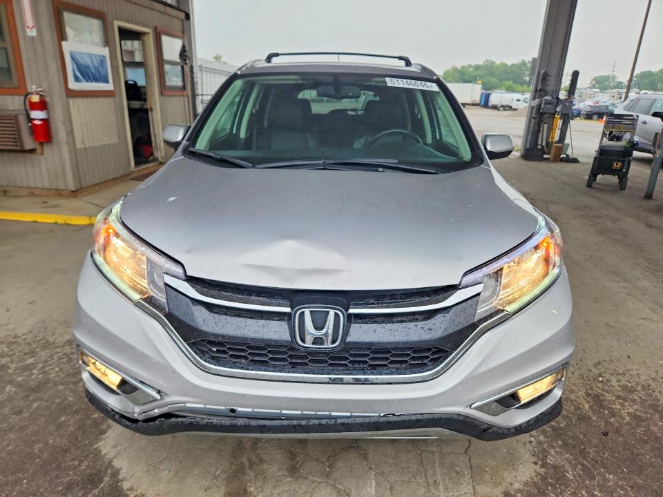 Photo 5 from auction – 2016 HONDA CR-V with VIN 2HKRM4H73GH713671