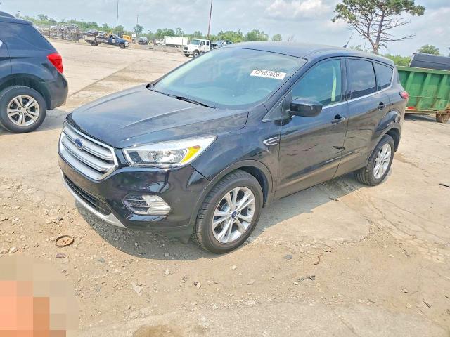 FORD ESCAPE 2019 with VIN 1FMCU0GDXKUB99771 - Photo from auction