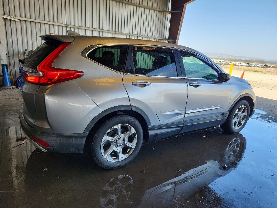 Photo 3 from auction – 2017 HONDA CR-V with VIN 7FARW1H89HE012235