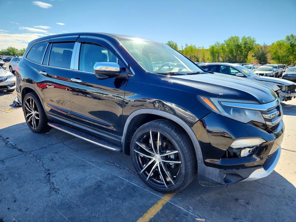 Photo 4 from auction – 2016 HONDA PILOT with VIN 5FNYF6H59GB079863