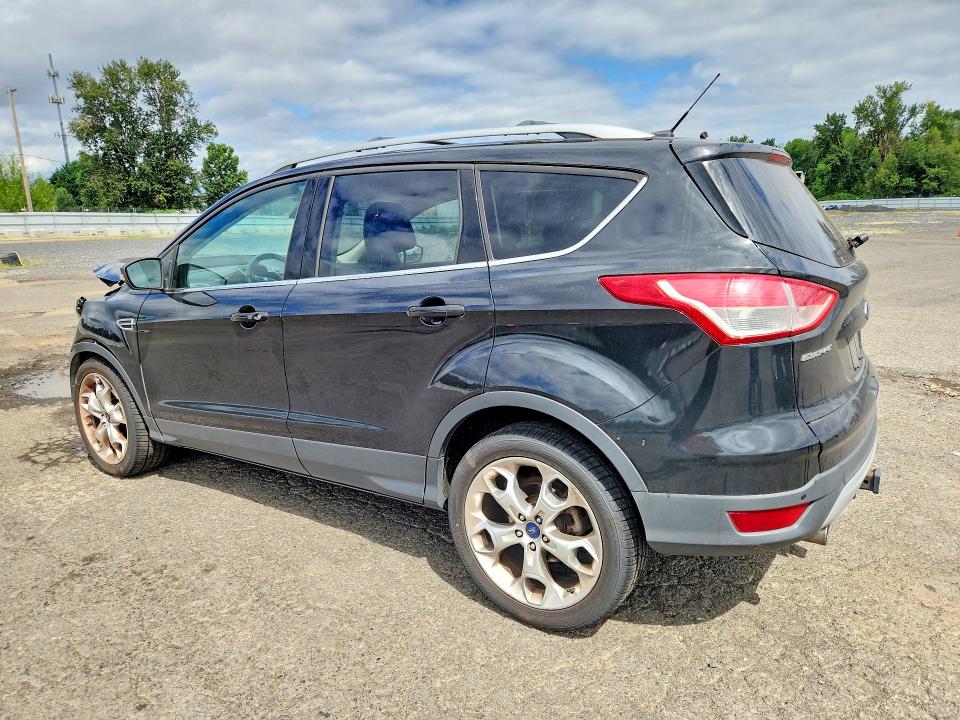 Photo 2 from auction – 2013 FORD ESCAPE with VIN 1FMCU0J95DUA59571