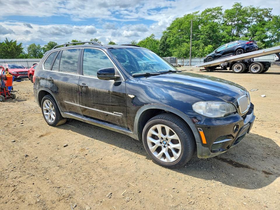 Photo 4 from auction – 2013 BMW X5 with VIN 5UXZV4C56D0B24093