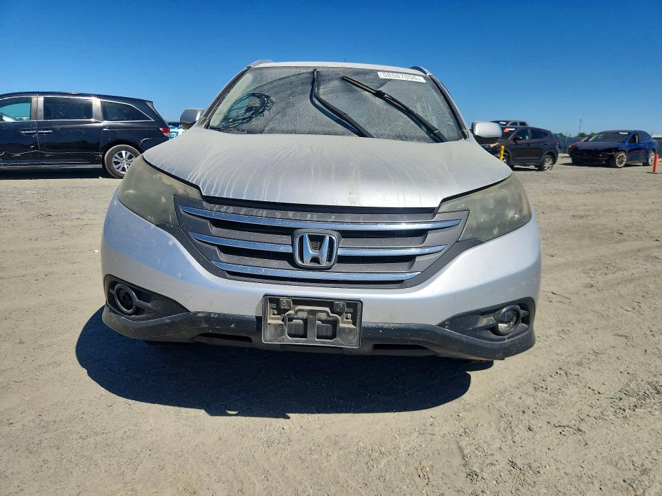 Photo 5 from auction – 2012 HONDA CR-V with VIN JHLRM4H76CC021395