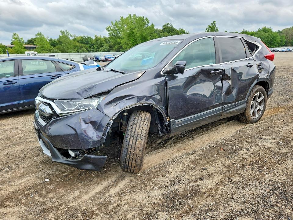 HONDA CR-V 2018 with VIN 7FARW2H8XJE048446 - Photo from auction