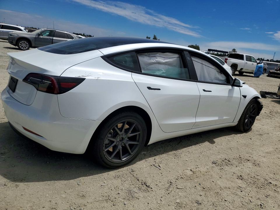 Photo 3 from auction – 2023 TESLA MODEL 3 with VIN 5YJ3E1EAXPF585476