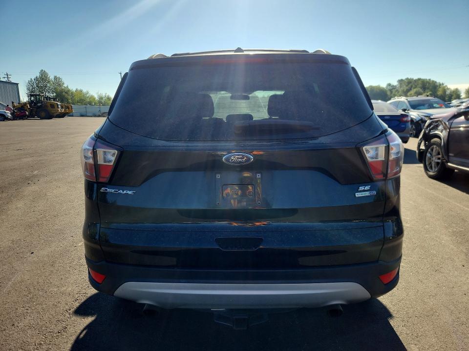 Foto 6 de la subasta – 2018 FORD ESCAPE con VIN 1FMCU9GD8JUC90038