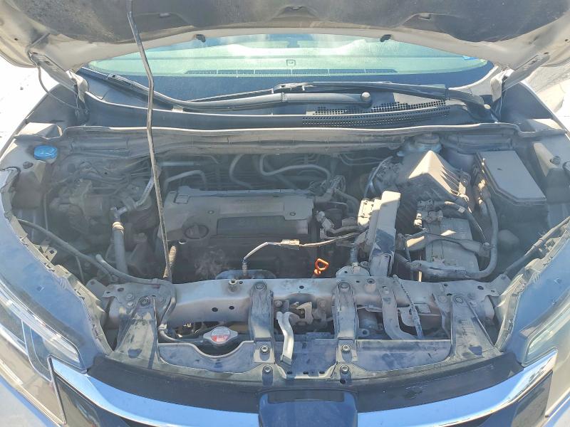 Photo 12 from auction – 2015 HONDA CR-V with VIN 2HKRM4H74FH615859