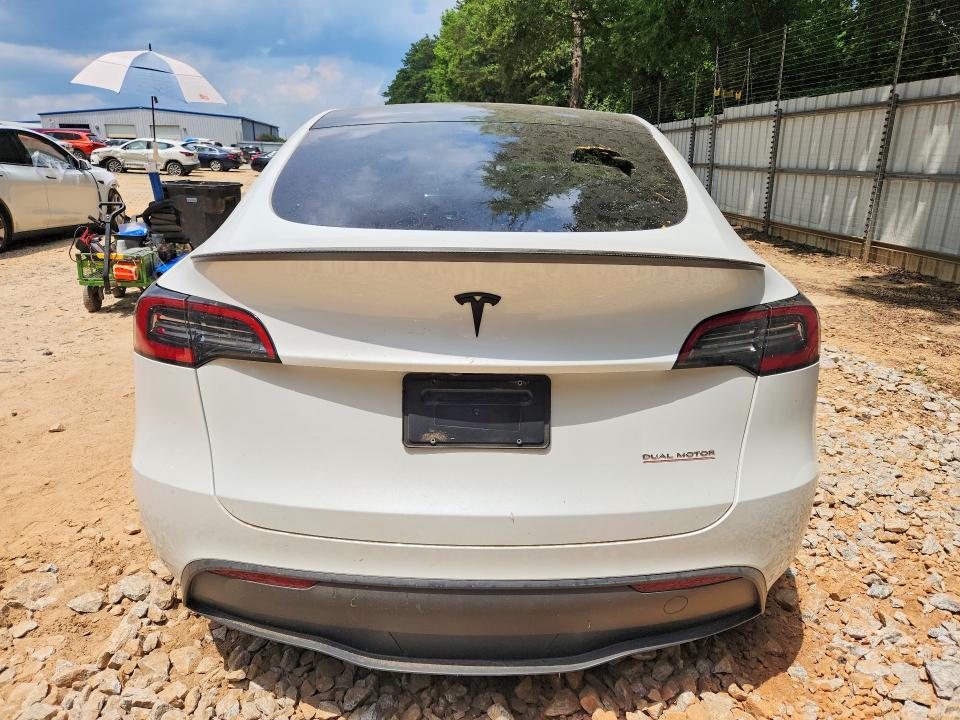 Photo 6 from auction – 2023 TESLA MODEL Y with VIN 7SAYGDEF1PF809282
