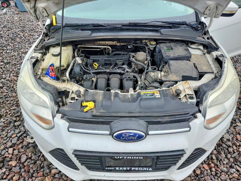 Photo 11 from auction – 2012 FORD FOCUS with VIN 1FAHP3F21CL289276