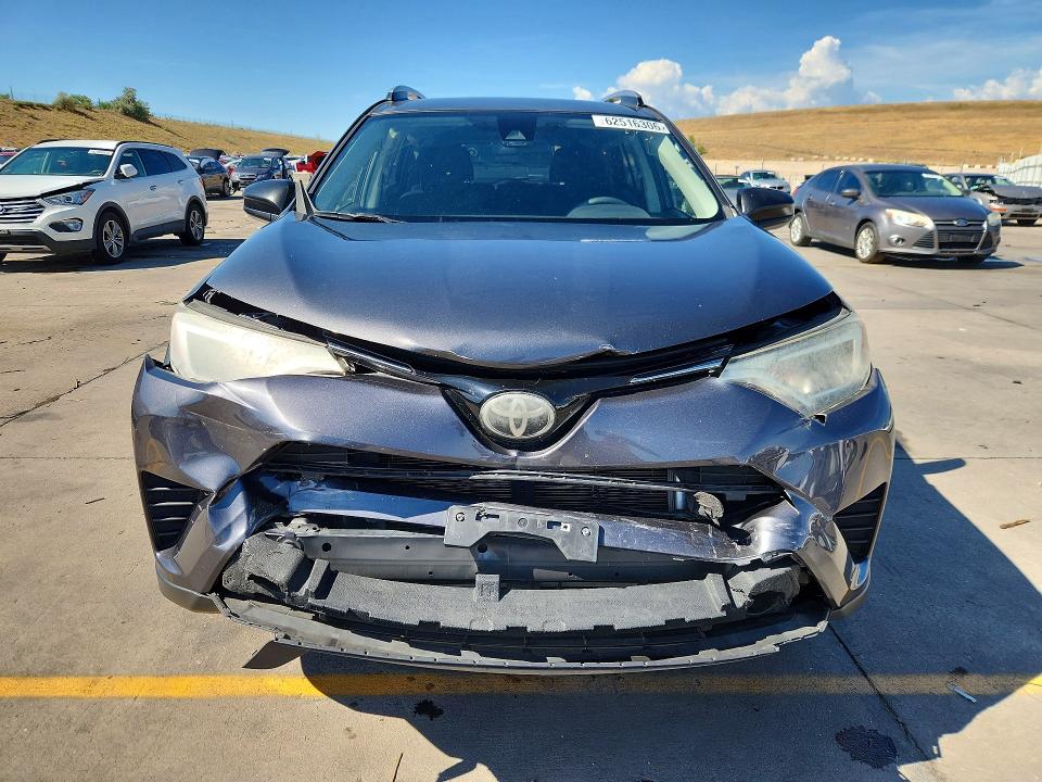 Photo 5 from auction – 2017 TOYOTA RAV4 with VIN JTMBFREV1HJ124803