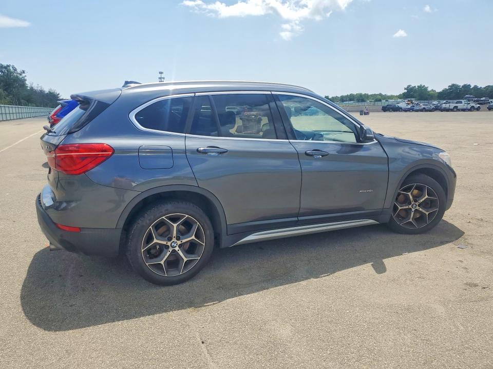 Photo 3 from auction – 2016 BMW X1 with VIN WBXHT3C38G5E53254