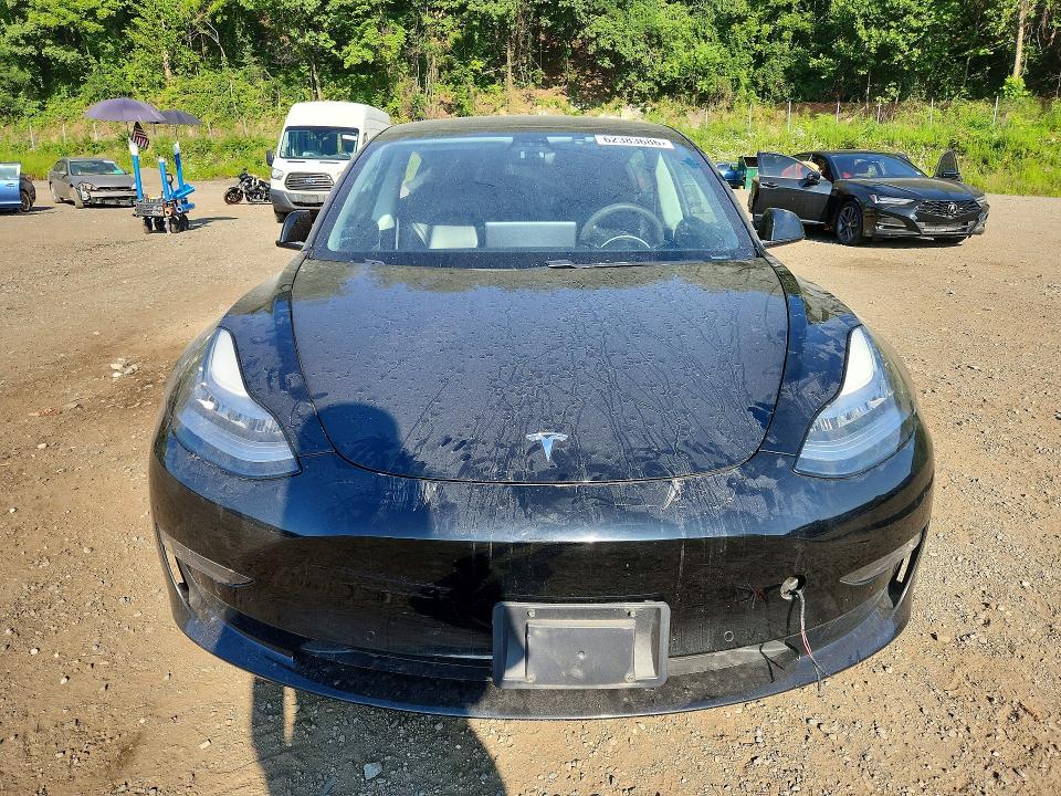 Photo 5 from auction – 2021 TESLA MODEL 3 with VIN 5YJ3E1EB4MF859534