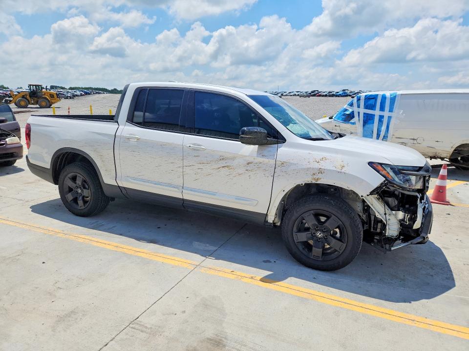 Photo 4 from auction – 2025 HONDA RIDGELINE with VIN 5FPYK3F80SB037721