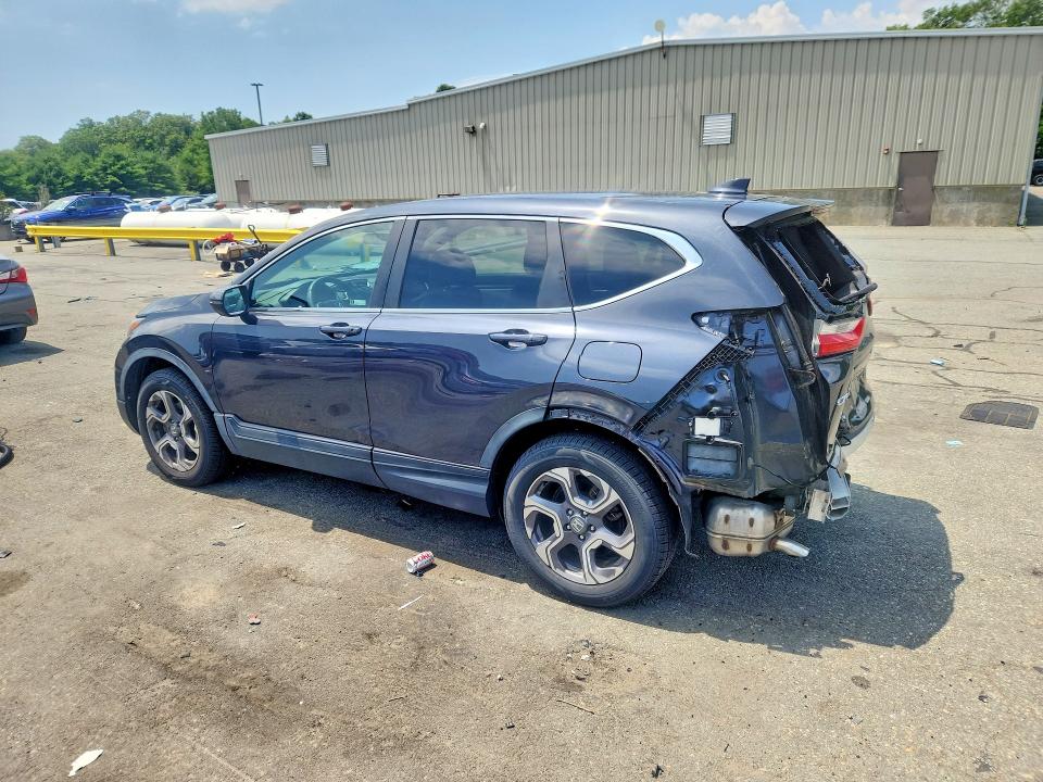 Photo 2 from auction – 2018 HONDA CR-V with VIN 7FARW2H54JE028943