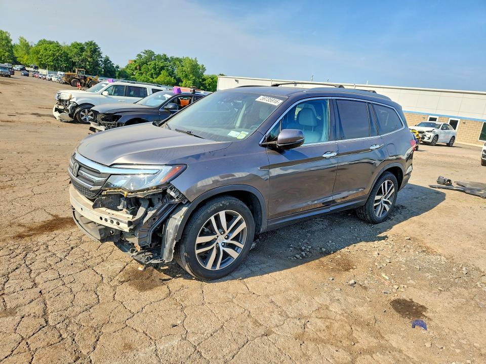 HONDA PILOT 2016 with VIN 5FNYF6H90GB070164 - Photo from auction