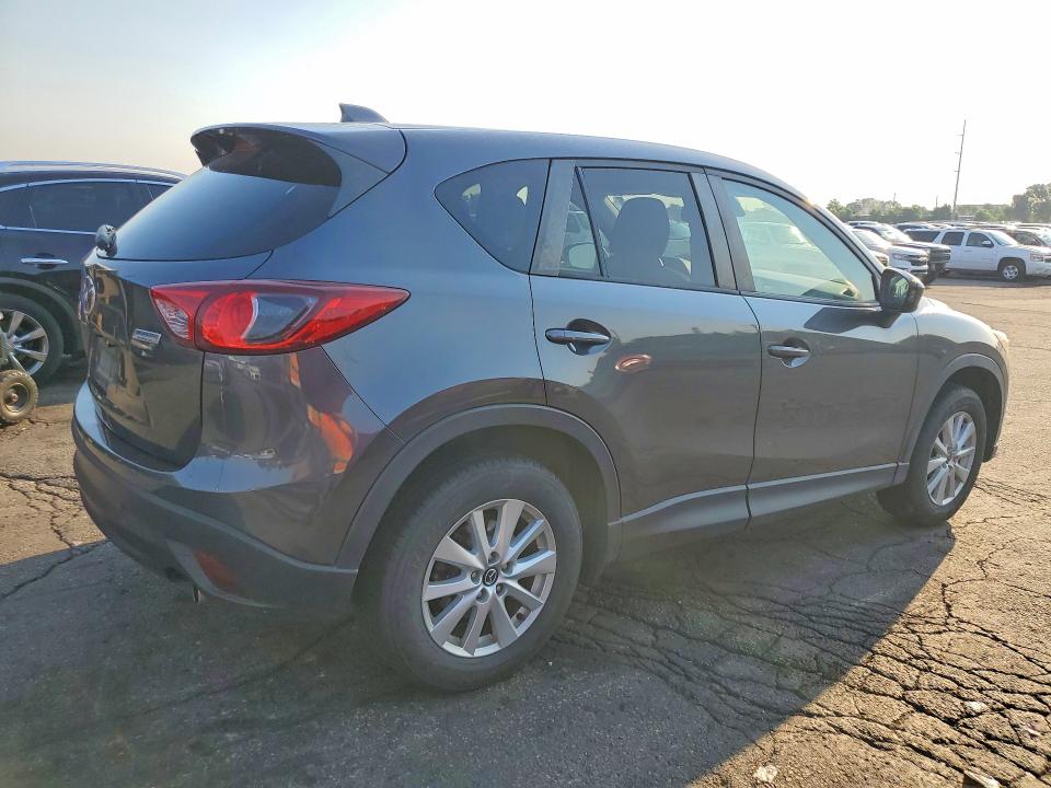 Photo 3 from auction – 2014 MAZDA CX-5 with VIN JM3KE4CY0E0376232