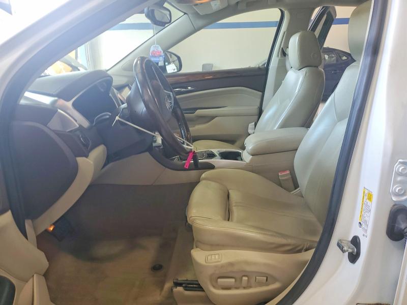 Фото 7 с аукциона – 2014 CADILLAC SRX с VIN 3GYFNDE37ES611708