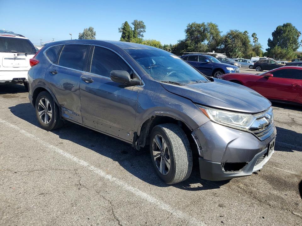 Photo 4 from auction – 2019 HONDA CR-V with VIN 5J6RW5H34KL001567