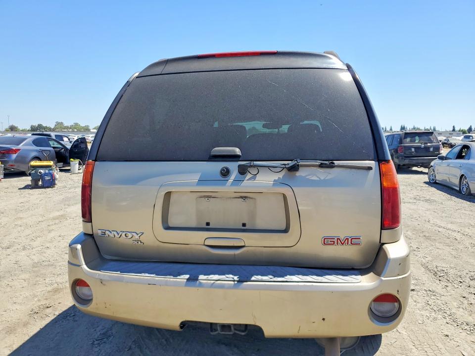 Photo 6 from auction – 2004 GMC ENVOY with VIN 1GKET16S546164704