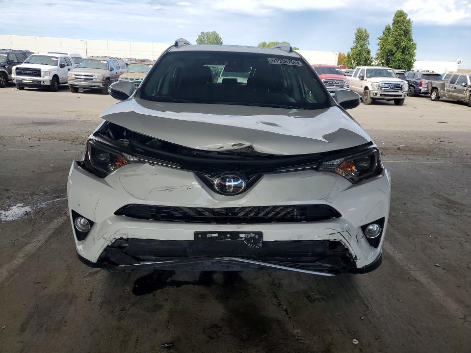 Photo 5 from auction – 2018 TOYOTA RAV4 with VIN 2T3WFREV5JW412638