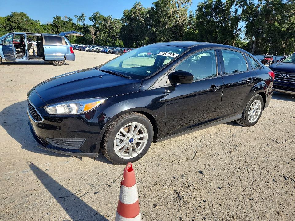 FORD FOCUS 2018 with VIN 1FADP3FE4JL203738 - Photo from auction