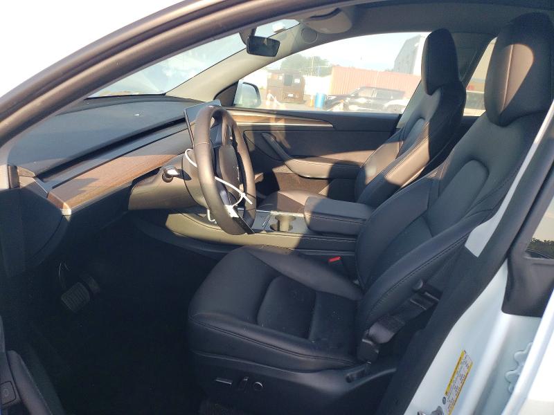 Photo 7 from auction – 2023 TESLA MODEL Y with VIN 7SAYGDED6PF940819